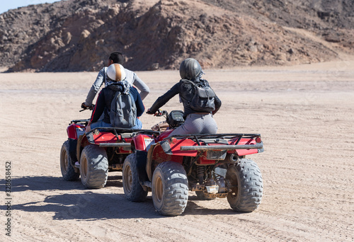 Tours of the desert on Quad bikes. ATV safaris. A vehicle for racing in the Sahara.