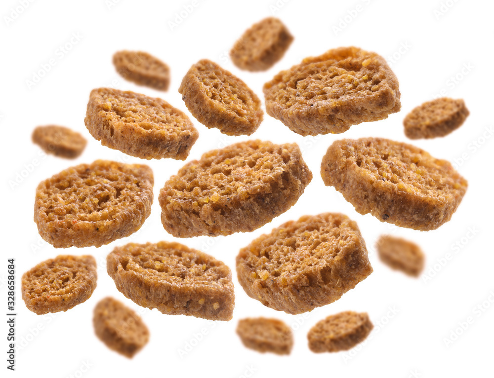 Bread croutons levitate on a white background Bread croutons levitate on a white background