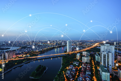 Smart city and wireless communication network concept. Digital network connection lines of Hanoi city, Vietnam at Linh Dam peninsula, Hoang Mai district