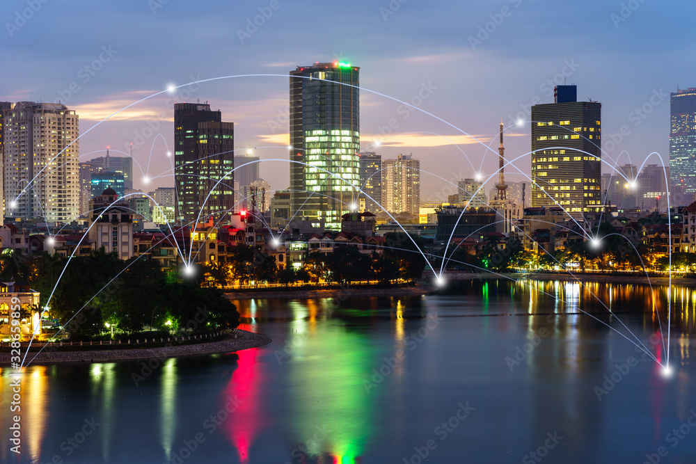 Fototapeta premium Smart city and wireless communication network concept. Digital network connection lines of Hanoi at Hoang Cau lake