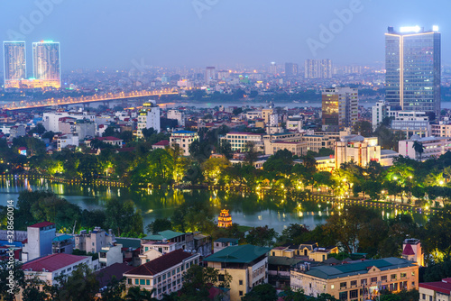 Aerial skyline view of Hanoi city, Vietnam. Hanoi cityscape by sunset period at Hoan Kiem district, center of Hanoi