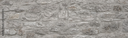 Banner: Textur Alte graue Steinmauer. unregelmäßige Steine