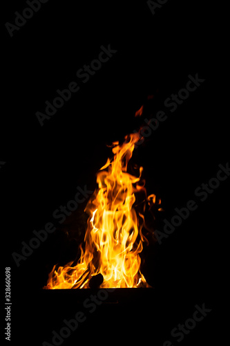 Danger fire on a dark background. Background from fire. Fire pattern can be used in design