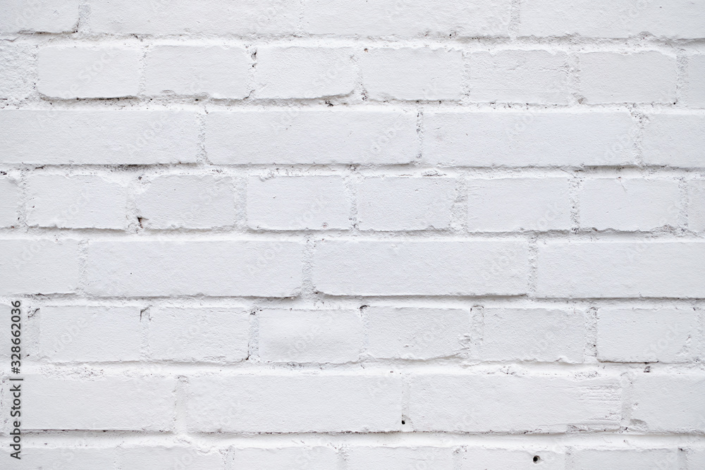 Wall of brick painted with white paint. Wall of brick painted with white paint.