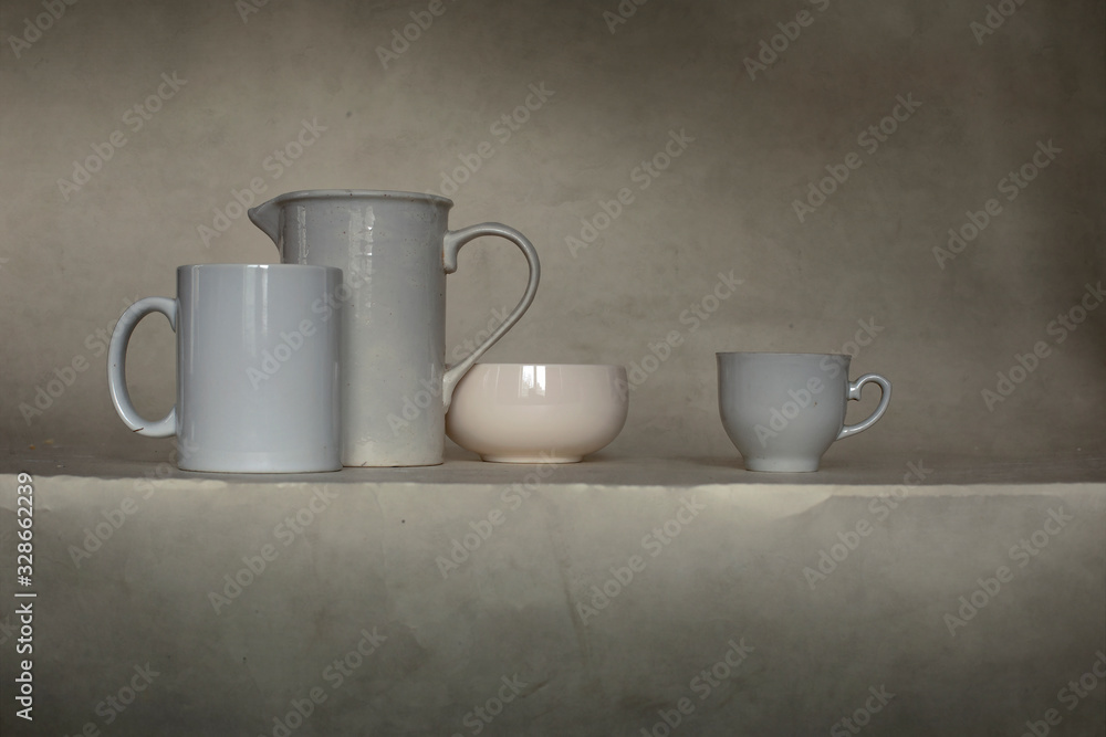 two cups on wooden table two cups on wooden table