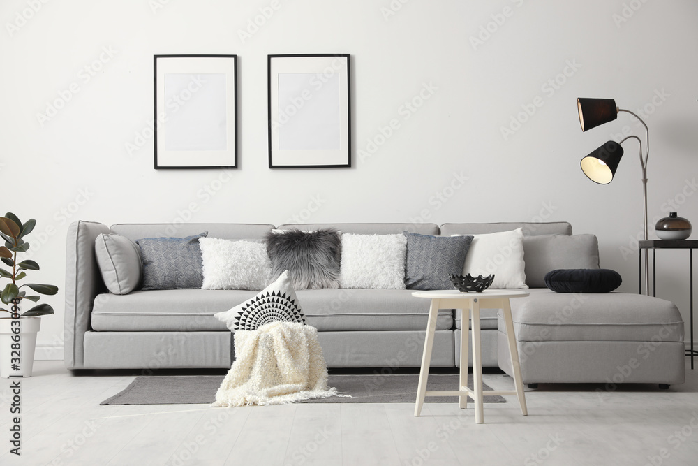 Plakat Stylish living room interior with comfortable sofa