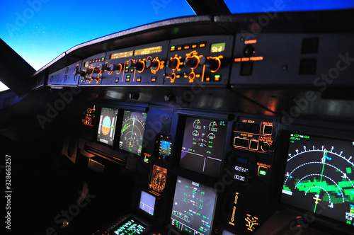 Flight deck of an Airbus A 320 in flight at night taken from the first officer seat