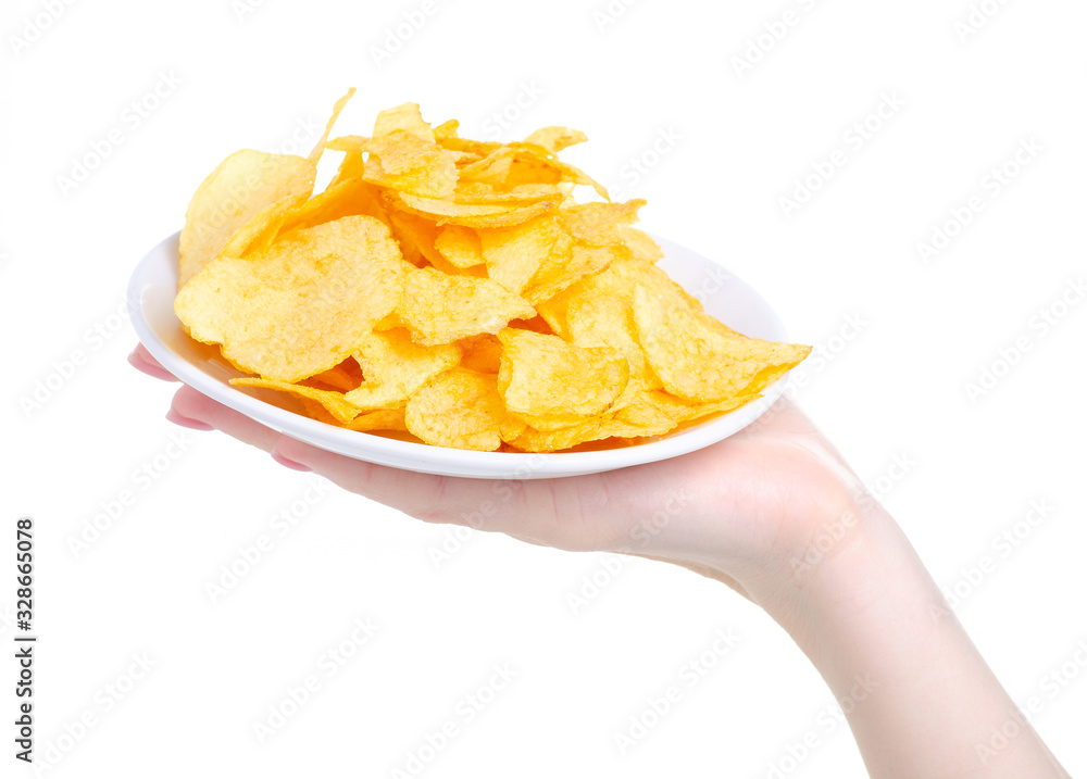 White plate of crisps snack in hand on white background isolation White plate of crisps snack in hand on white background isolation