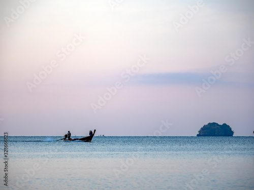 Traditional long tail boat on Ao Nang beach in Krabi Thailand