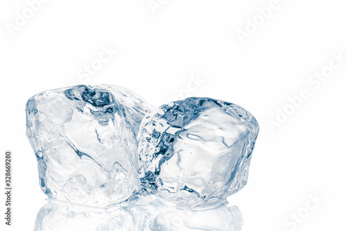 Natural crystal clear melting single ice cubes on white background.