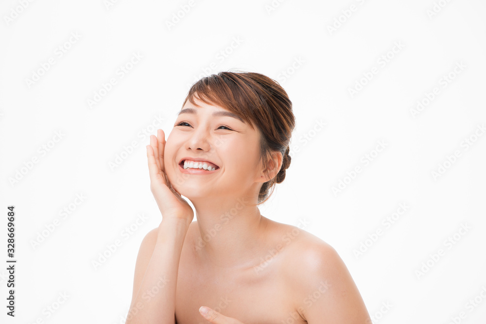 Portrait of Beautiful Skin care woman enjoy and happy, touching her face,isolated with clipping path.