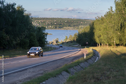 Very beautiful view of the highway and the lake.