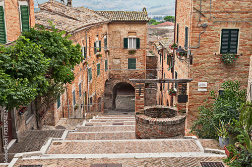 Fototapeta Naklejka Na Ścianę i Meble -  Corinaldo, Ancona, Marche, Italy: the long staircase in the downtown of the ancient village