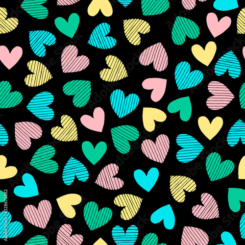 Hearts in doodle style. Seamless vector pattern in bright color palette.