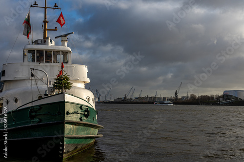 ship at bridge 10 famous fish buns at landungsbrücken in Hamburg, germany