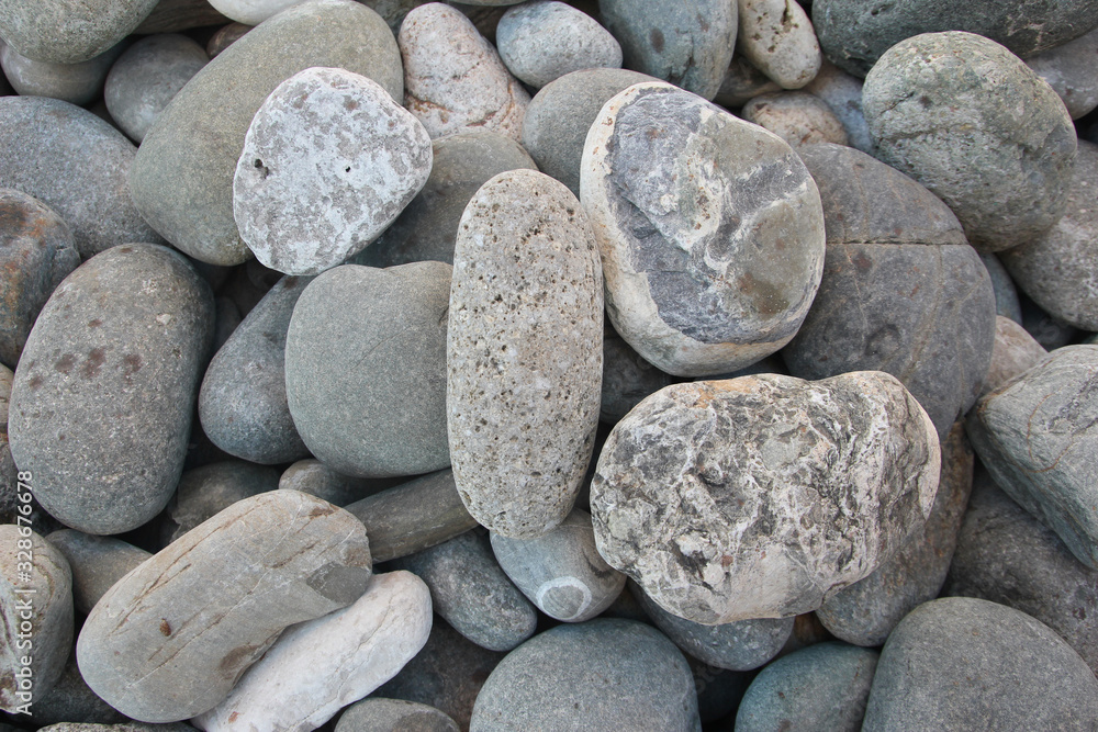 Large pebbles under the water surface photo background summer sea Large pebbles under the water surface photo background summer sea