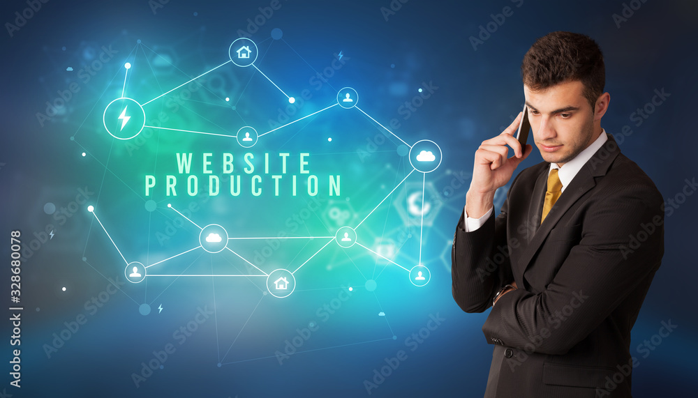 Businessman in front of cloud service icons with WEBSITE PRODUCTION inscription, modern technology concept Businessman in front of cloud service icons with WEBSITE PRODUCTION inscription, modern technology concept