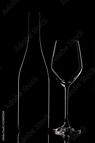 Wine bottle glasses silhouettes dark theme