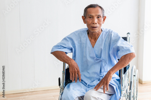 Senior man patient in his wheelchair in the hospital.