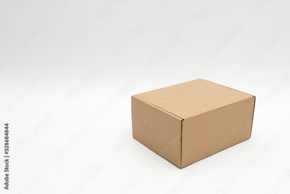 Closed cardboard box on a white background Closed cardboard box on a white background