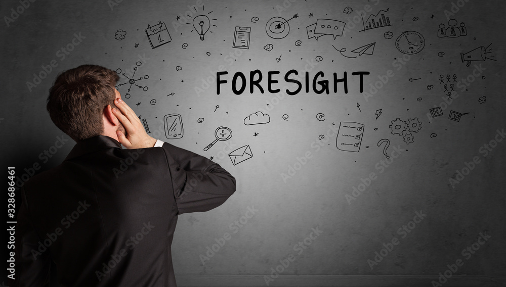 businessman drawing a creative idea sketch with FORESIGHT inscription, business strategy concept businessman drawing a creative idea sketch with FORESIGHT inscription, business strategy concept