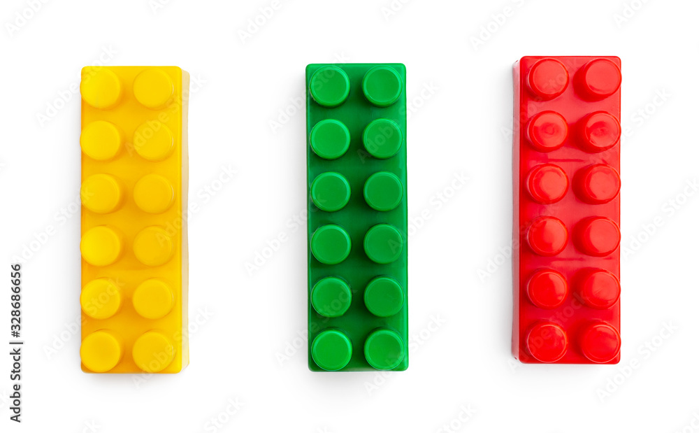 Three pieces of toys bricks on white. Three pieces of toys bricks on white.