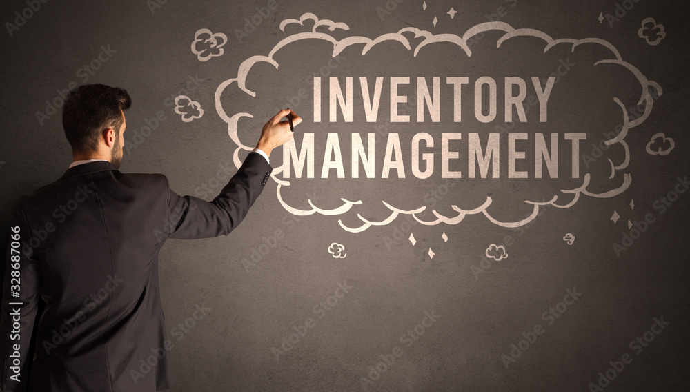businessman drawing a cloud with INVENTORY MANAGEMENT inscription inside, modern business concept