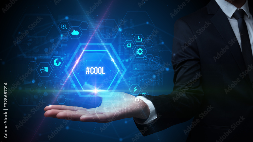 Man hand holding #COOL inscription, social media concept Man hand holding #COOL inscription, social media concept