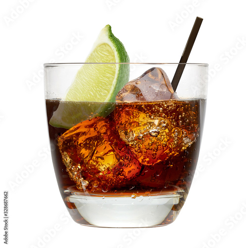 Vanilla vodka, rum or Cuba Libre with lime and cola in glass isolated on white background