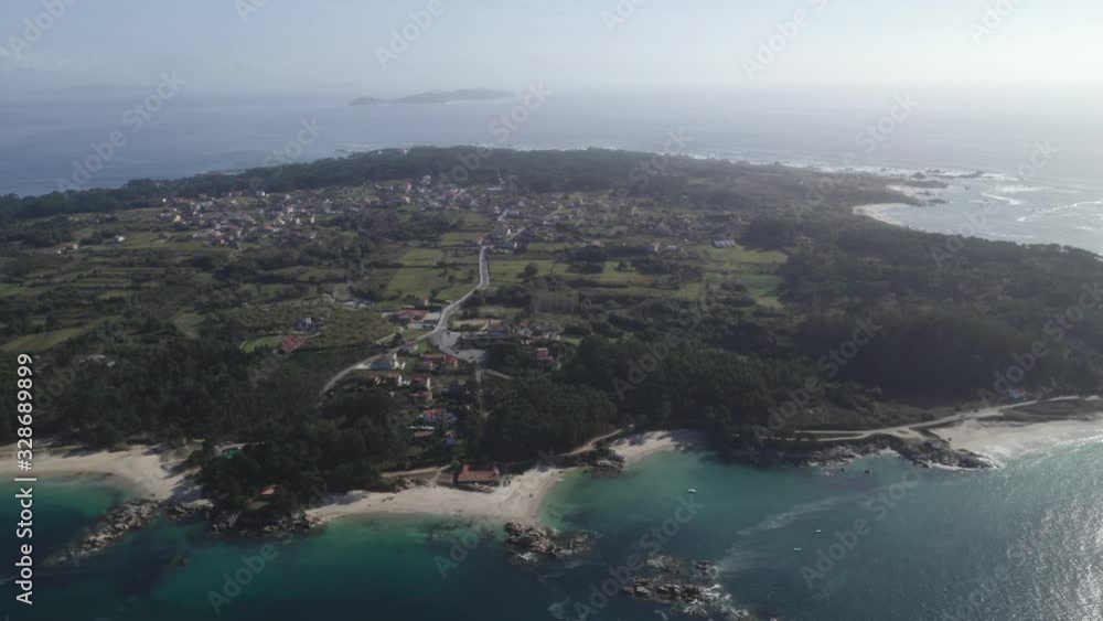 Arousa island paradise drone aerial over turquoise water with boats on the sea and beautiful beach landscape, in Spain Arousa island paradise drone aerial over turquoise water with boats on the sea and beautiful beach landscape, in Spain