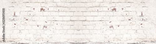 White painted damaged rustic brick wall texture banner panorama