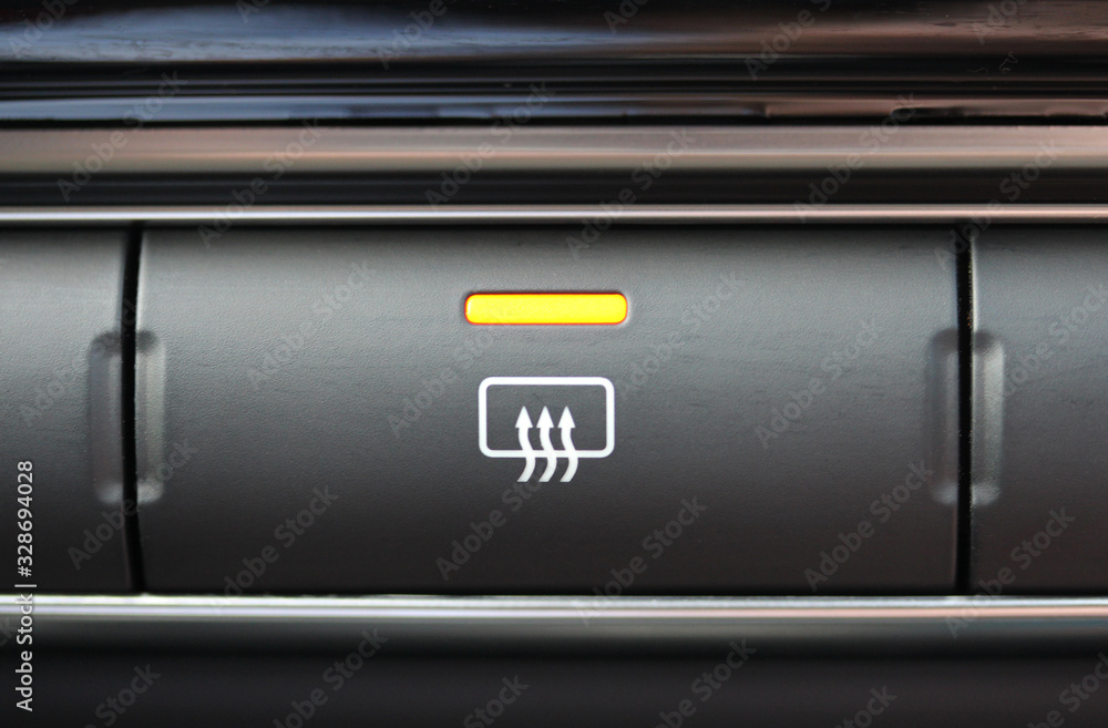 Rear demister button in vehicle Rear demister button in vehicle