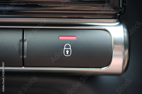 Modern vehicle power lock button © hanjosan