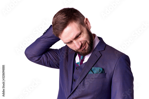 Doubting young man on a white background.