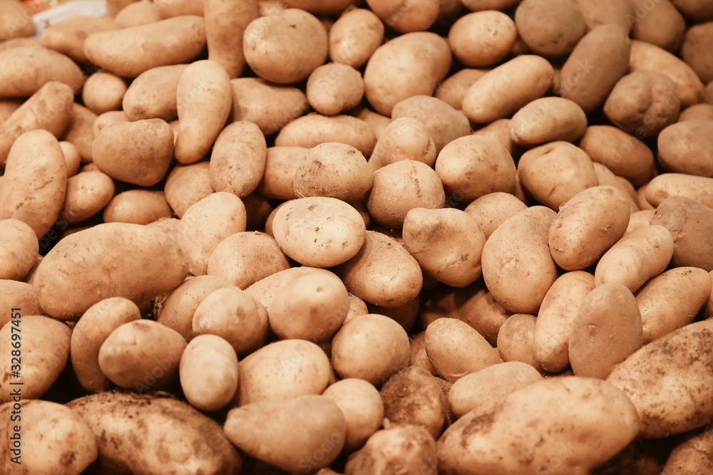A plenty of potato in the market, potato background A plenty of potato in the market, potato background