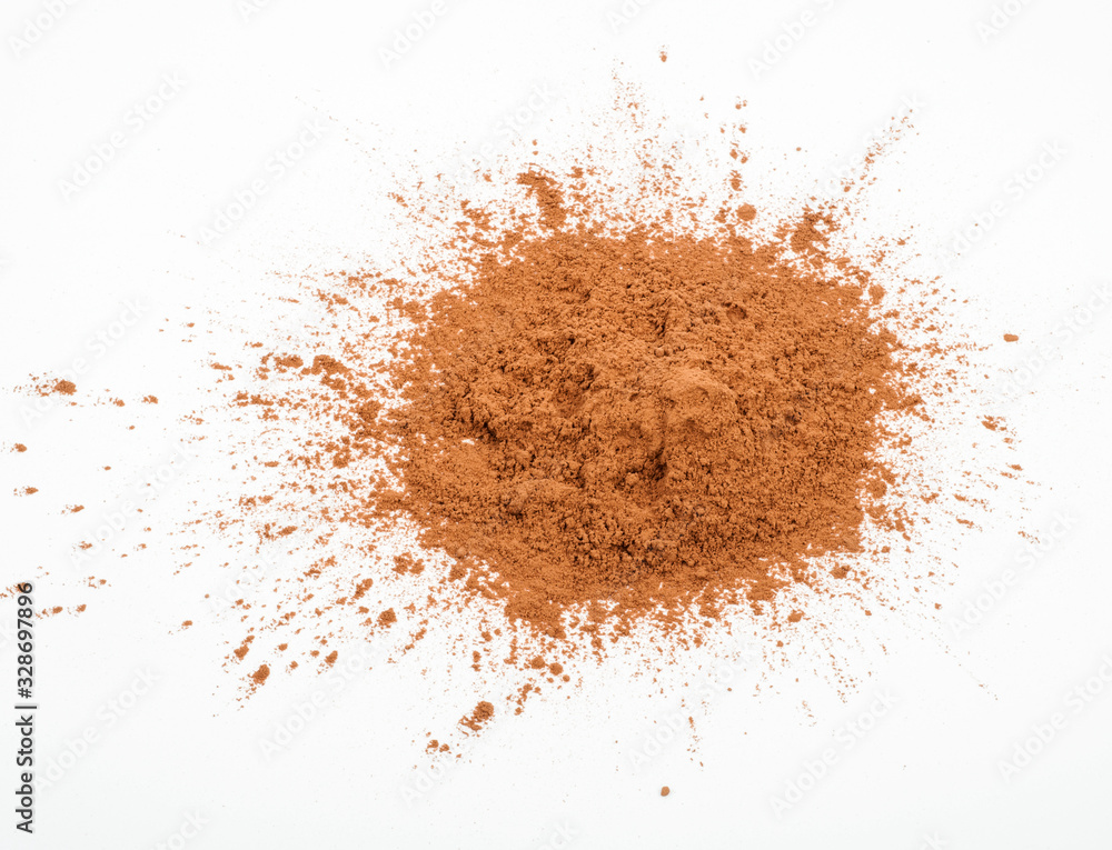 Pile cocoa powder on white background Pile cocoa powder on white background