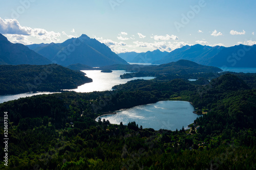 View of El Trebol Lagoon, Perito Moreno Lake and the mountains taken from Mount Campanario viewpoint (Cerro Campanario). Bariloche, Argentina