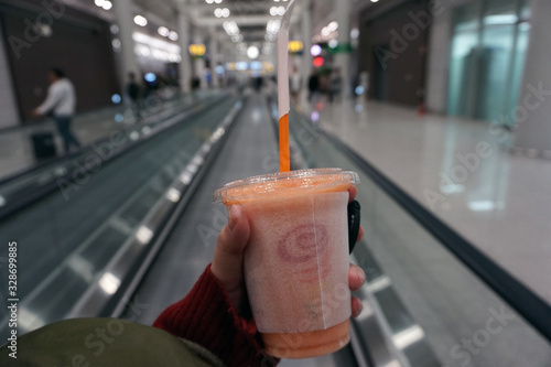 Incheon, South Korea - 10th March 2019 : Jamba Juice, holding by hand at the international airport in Incheon