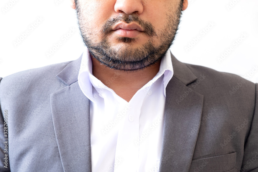 Businessman in gray color suit with beard and mustache Businessman in gray color suit with beard and mustache