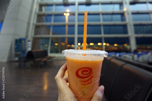 Incheon, South Korea - 10th March 2019 : Jamba Juice, holding by hand at the international airport in Incheon