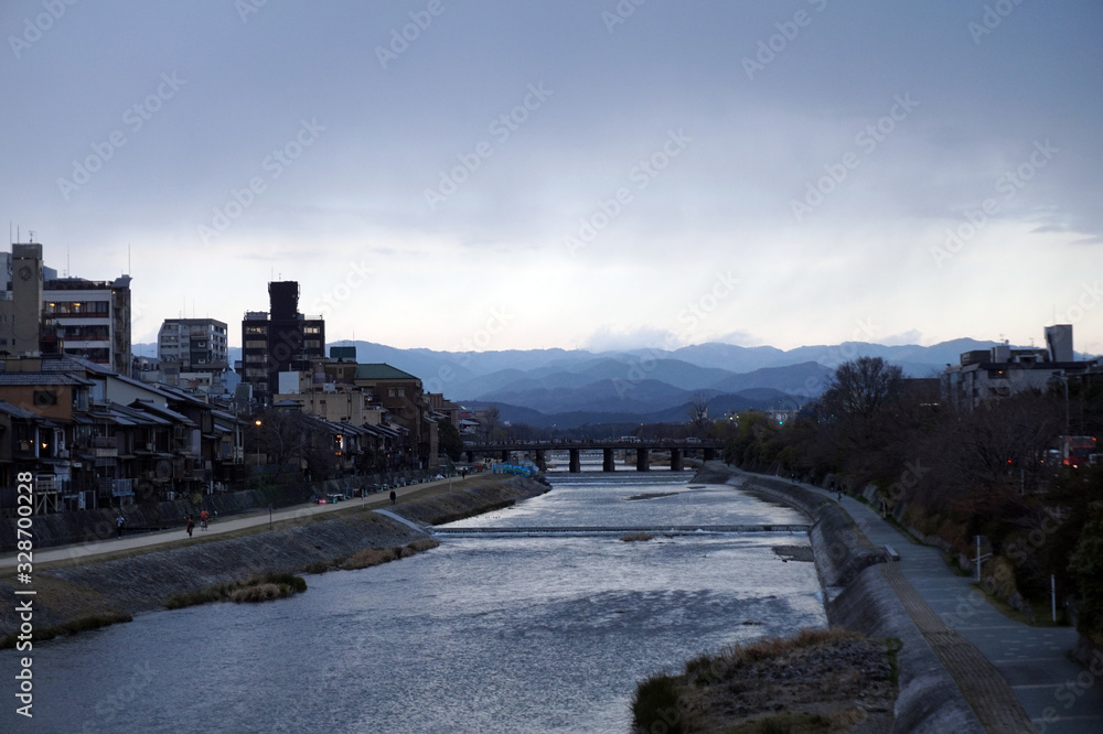 Kyoto, Japan - 11th March 2019 : Scenery of Kamogawa River in Kyoto in the evening