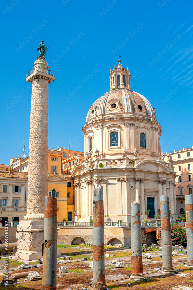 Antique architecture of Rome. Panorama of Ancient Roman Trajan's Column in the Rome city center. Above famous architectural landmark.