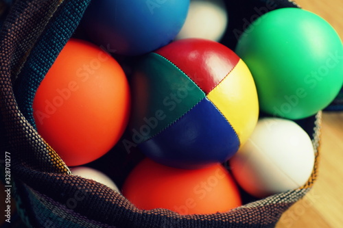 Фотография Close up of colorful different juggling balls in a bag