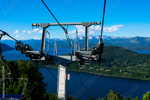 Chairlift tower with Nahuel Huapi Lake in the background. Taken from Mount Campanario (Cerro Campanario). Bariloche, Argentina