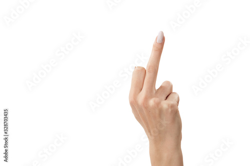 the female hand shows a middle finger gesture is isolated on a white background