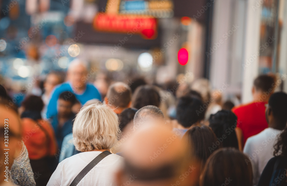 Mass of people walking on the street. Urban street photography concept Mass of people walking on the street. Urban street photography concept