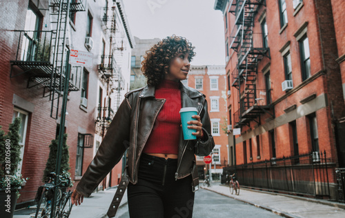 Beautiful girl walking in New york city, concept about new yorkers and lifestyle