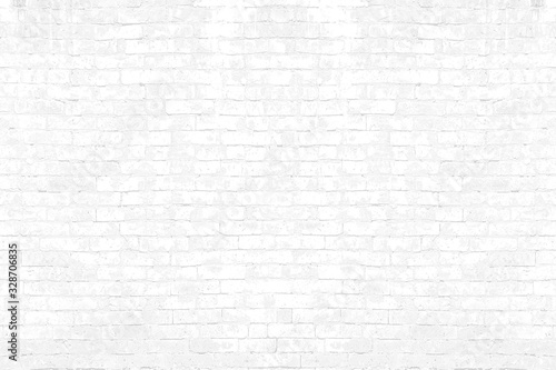 Old white brick wall texture background. Abstract weathered brickwork.