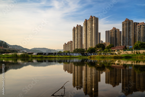 City buildings by the river © chen