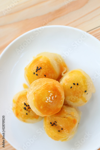 Chinese pastry or moon cake filled with mung bean paste and salted egg yolk
